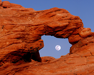 Moon in Sandstone Arch Window by Carl Crumley