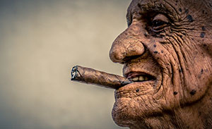 Weathered Man with Cigar by DeDe Hartung