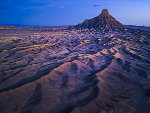 Sunset Factory Butte by Larry Mandelker